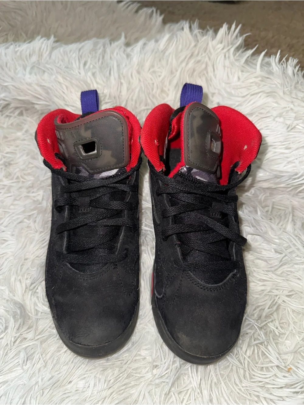 Nike Kids Black Sneakers with Red Lining and Purple Heel Tabs